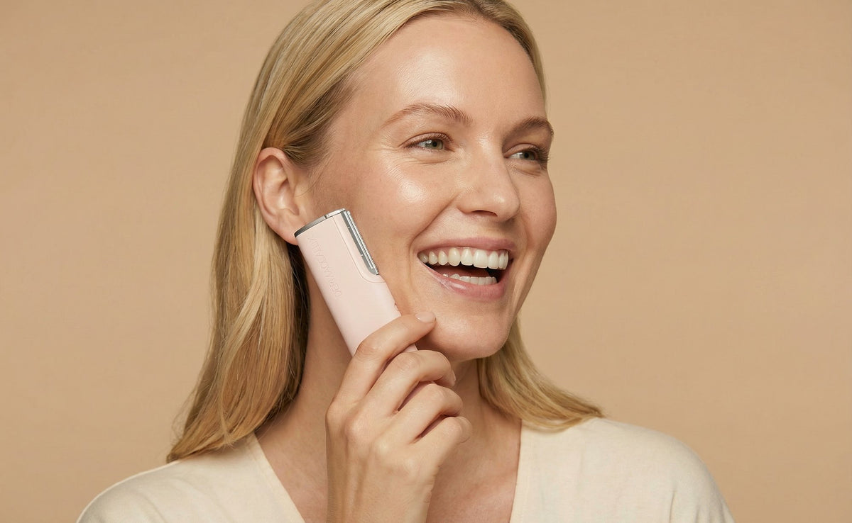 Woman smiling with GLEAUX ONE+